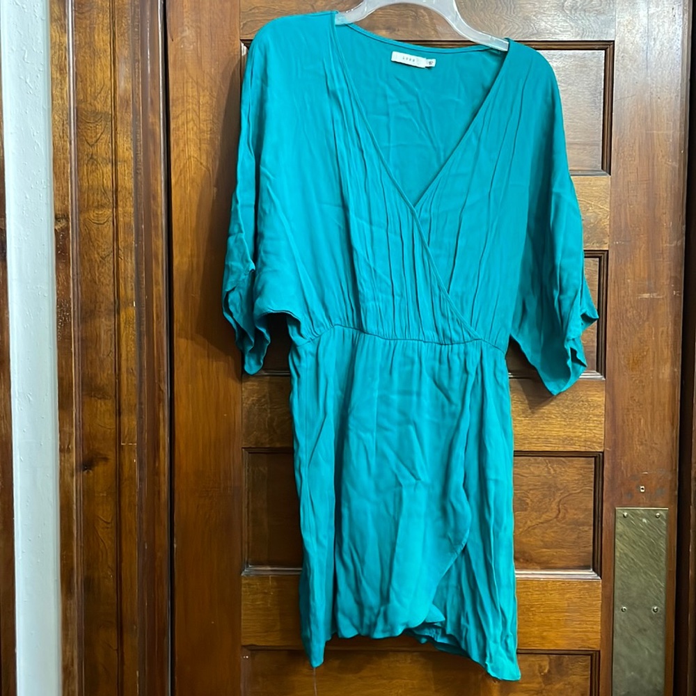 This dress is green and lightweight